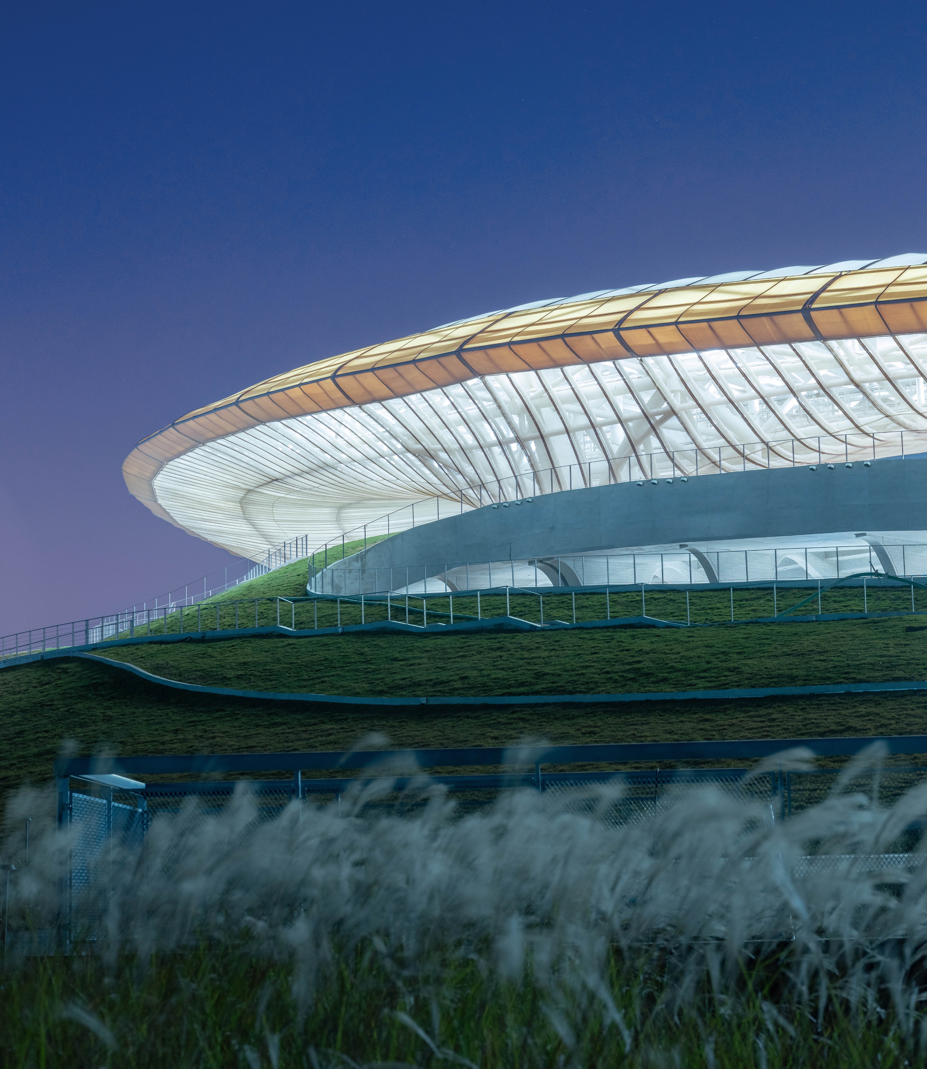 Стадион арт. Спортивный кампус в Цюйчжоу. Спортивный парк Цюйчжоу. Стадион Архитектор.