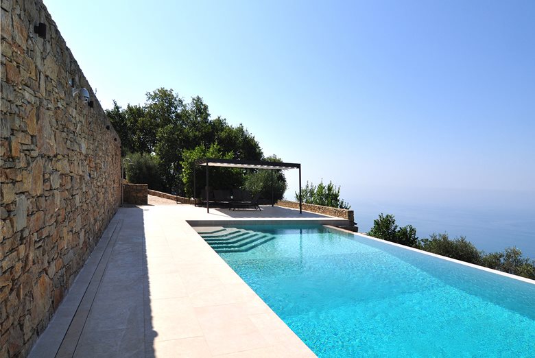 A villa between sea and olive trees