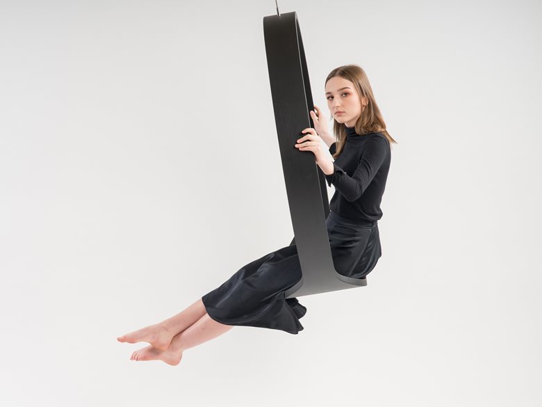 Swing model n.1 acts as a contemporary rocking chair
