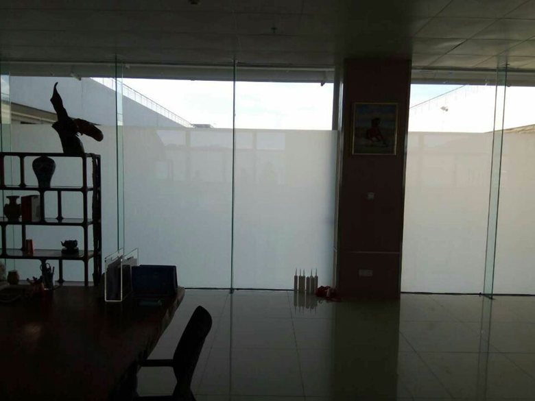 Smart switchable glass for automatic door application