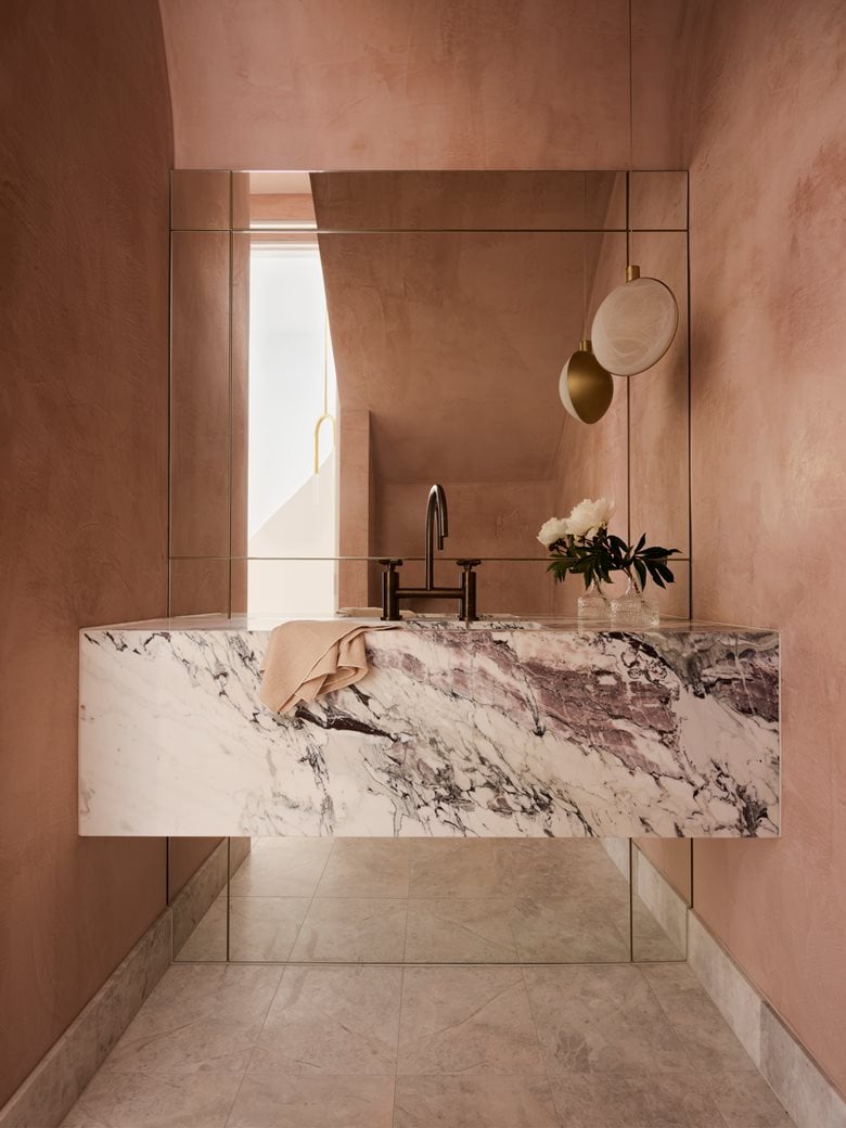 A zen family home full of blush-toned marble