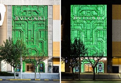 A jade façade made from recycled champagne bottles for Bulgari Shanghai by MVRDV